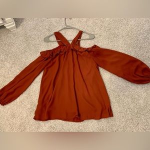 Rust colored peekaboo shoulder blouse